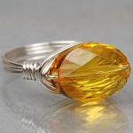 Wire Wrapped Sterling Silver Ring With Light Topaz..