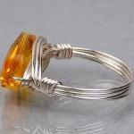 Wire Wrapped Sterling Silver Ring With Light Topaz..