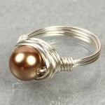 Wire Wrapped Sterling Silver Ring With Bronze..